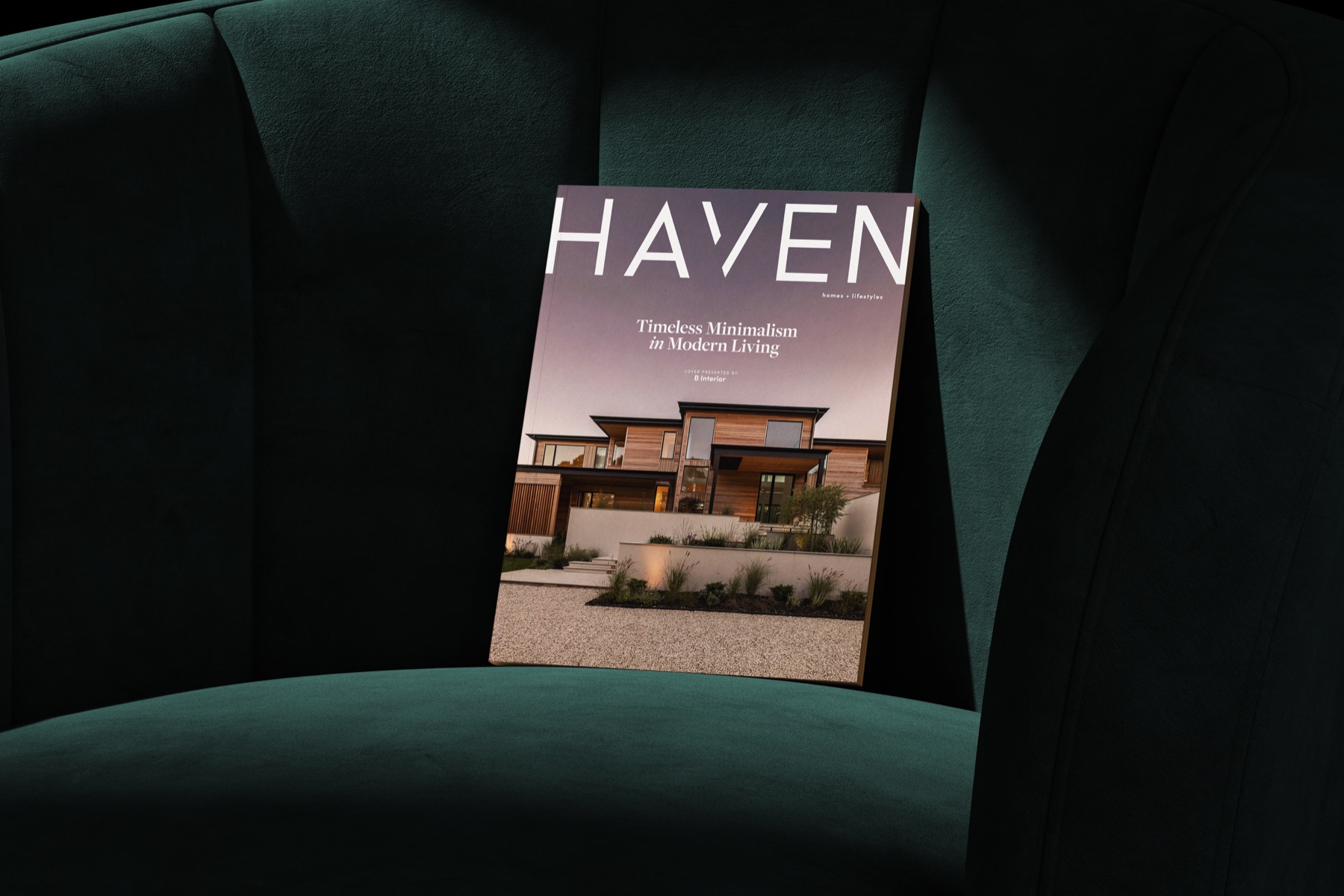 A HAVEN issue propped on a velvet chair
